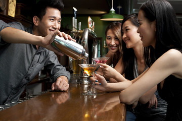 Bartender Serving Drinks