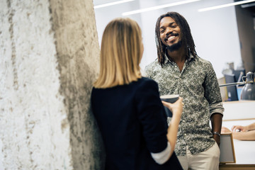 Colleagues in office talking