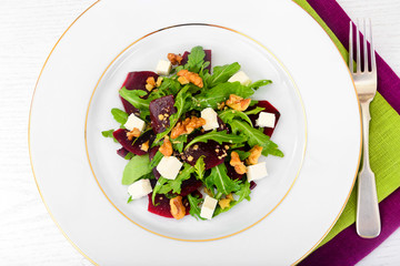 Salad of Raw Beets, Pears, Arugula, Roots, Sunflower Seeds and C