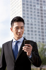Businessman Using Mobile Phone