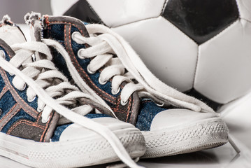 sneakers with a soccer ball