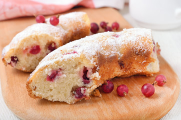 Piece of cake  with red gooseberries