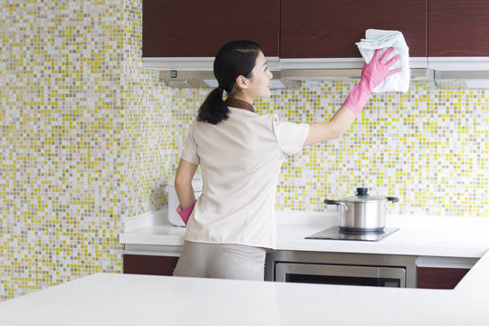 Domestic Staff Cleaning Kitchen