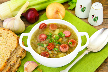 Healthy and Diet Food: Soup with Lentils, Celery and Sausage