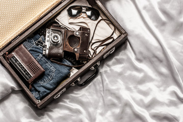 Traveler's suitcase with vintage items