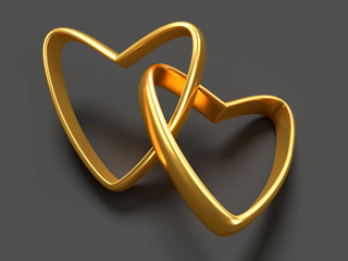 Two gold hearts rings