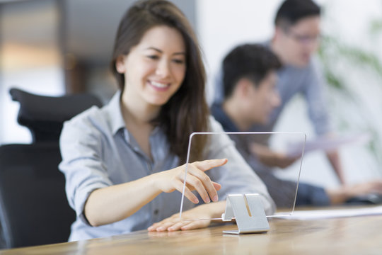 IT workers developing digital tablet