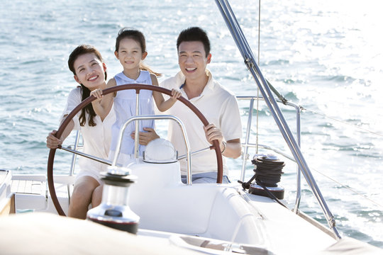 Happy family sailing