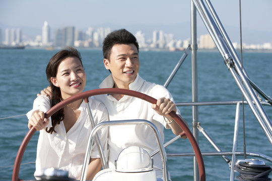 Young couple sailing