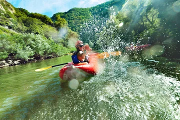 Foto op Canvas in river canoe splashes © VILevi