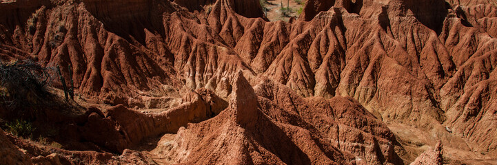 Huge big sand stone rock in the middle of drought Tatacoa desert, Huila