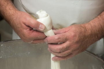 preparation of mozzarella in a dairy © Alextype