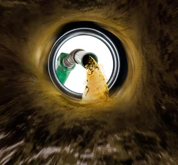 Refilling fuel view from inside of gas tank of a car © nexusseven