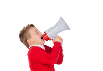 Small boy shouting through a megaphone  .