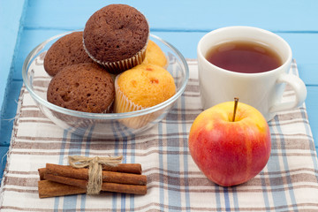 Tea, muffins, apples and cinnamon