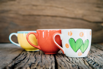 Hearts cup on wooden background, Valentine concept