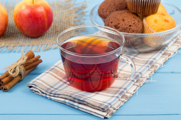 Chocolate cakes, tea and apples