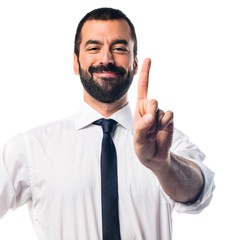 Businessman counting one