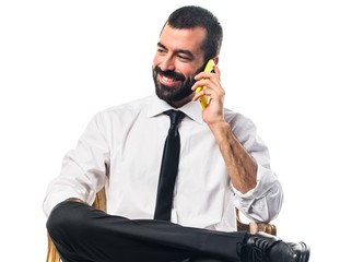 Businessman talking to mobile