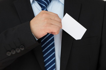 Man hand holding a business card