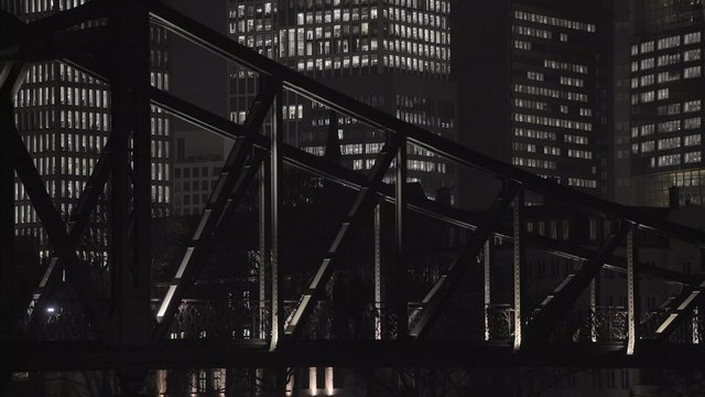 Night Bridge in front of business towers
