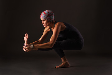 beautiful young girl engaged in yoga, gymnastics, fitness