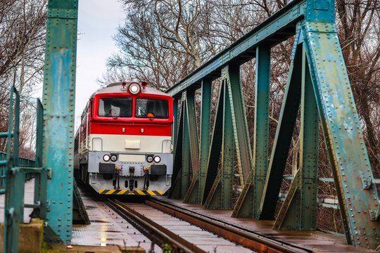 Train is coming through bridge