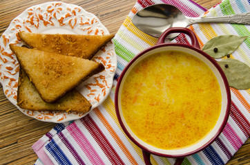 Cheese soup with garlic croutons
