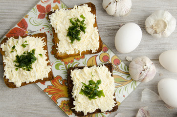 Fototapeta na wymiar Sandwiches with eggs and cheese