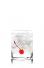 Old fashioned cocktail with cherry