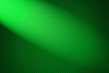 spotlight on green metallic mesh background.