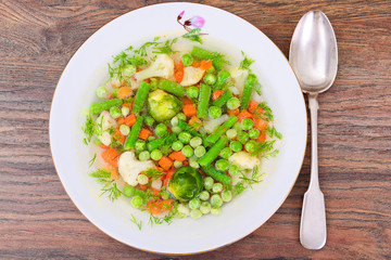 Soup with Cauliflower, Brussels Sprouts, Green Beans, Peas, Carr