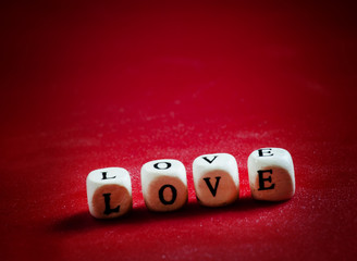 Wooden blocks with the word love, selective focus