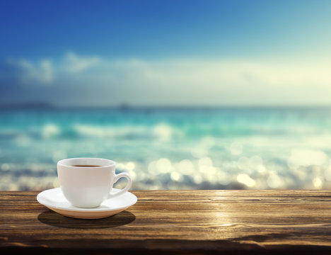 sea and cup of coffee