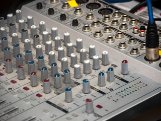 part of an audio sound mixer with buttons