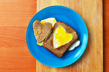 fried eggs in the form of heart