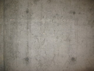 Obraz na płótnie Canvas stained concrete wall