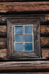 Obraz na płótnie Canvas window in a timber wall