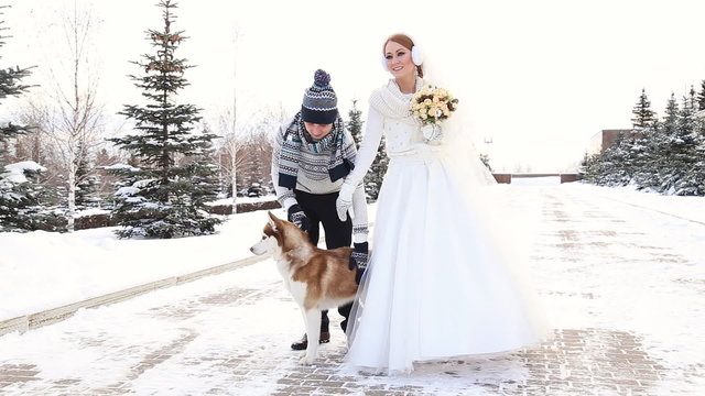 Wedding couple winter walking