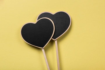 Heart Label. Writing board in heart shape on color background. 