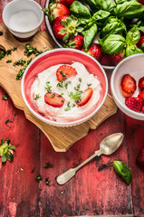 Curd with strawberries in bowl for healthy breakfast