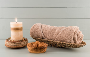 Fototapeta na wymiar Spa Towel with Bath Bombs and Candle
