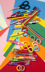 Arts and craft supplies.  Corrugated color paper, pencils, different washi tapes, craft scissors.