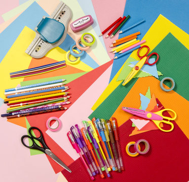 Arts and craft supplies.  Corrugated color paper, pencils, different washi tapes, craft scissors.