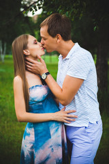 Fototapeta premium Pregnant Couple on the park
