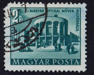 Hungary - CIRCA 1953:A stamp printed in Hungary shows image of cultural house of the Hungarian Optical Works, circa 1953.