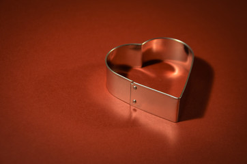 Valentines Card with heart shape on vivid red background