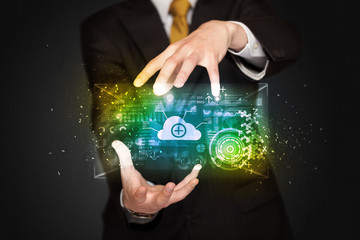 Businessman holding data cloud