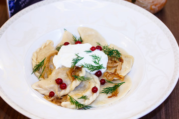 Ukrainian and Russian national food is vareniki, dough with fill