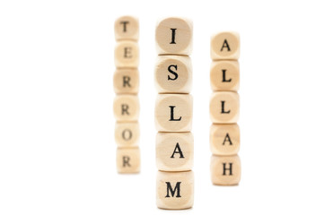Islam letters on wooden blocks†stacked against white background